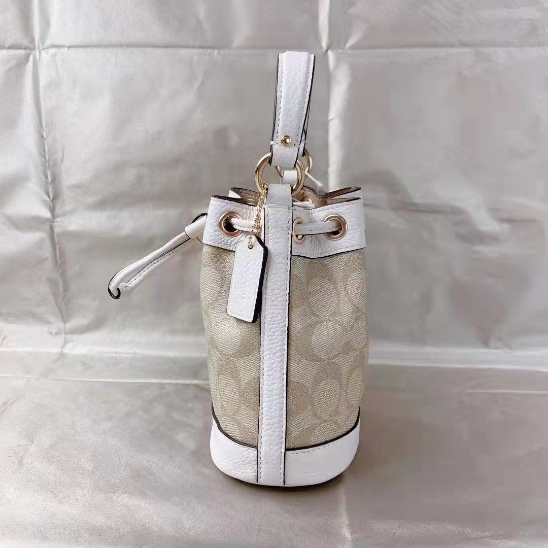 Coach C5121 Dempsey Drawstring Bucket 15 In Signature Canvas In Light Khaki Chalk Coach C5121 Dempsey Drawstring Bucket 15 In Signature Canvas In Light Khaki Chalk